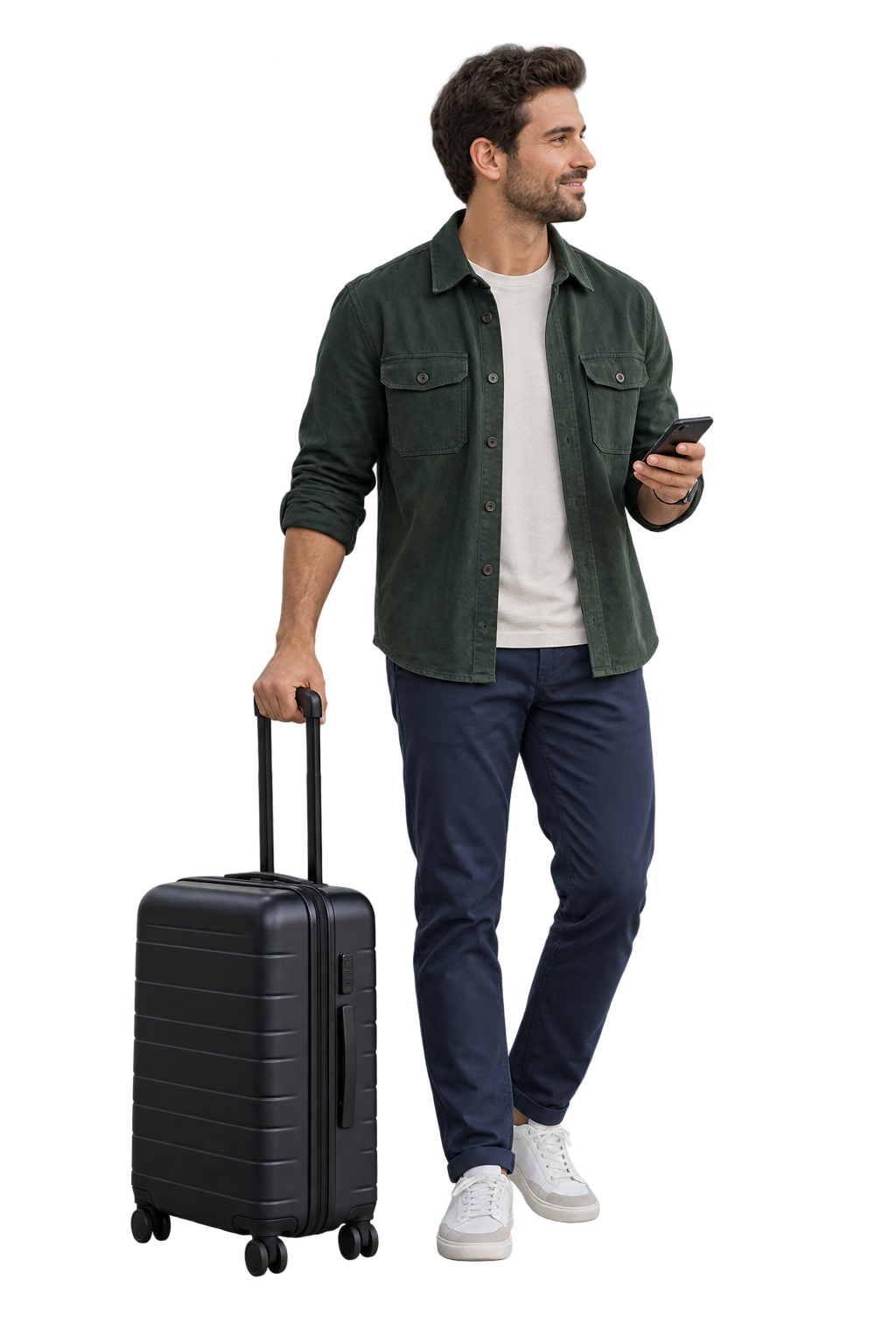 Man in a green overshirt holding a phone beside a black suitcase.