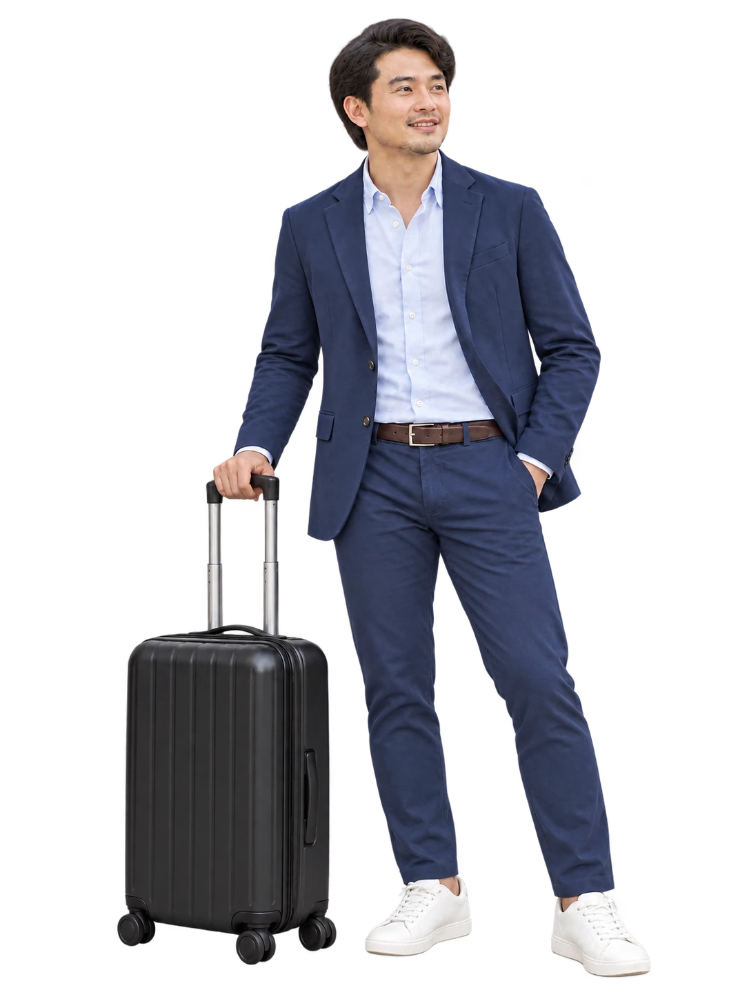 A business traveller in a navy blazer beside a black suitcase