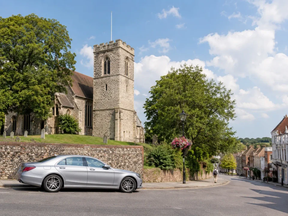 Executive saloon beside the parish church and high street in High Barnet