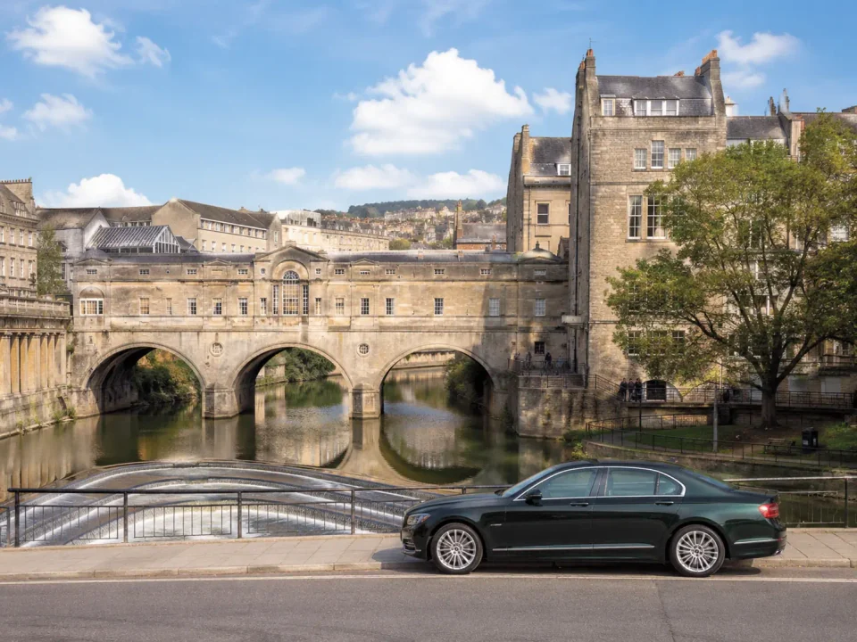 Executive saloon beside the River Avon with Pulteney Bridge in Bath