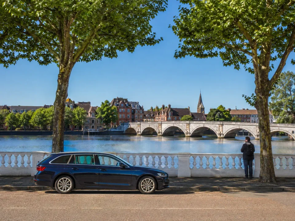Executive estate car beside the River Great Ouse Embankment in Bedford