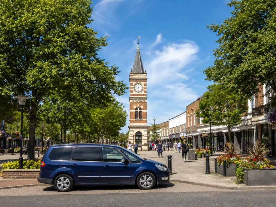 Premium people carrier beside the Broadway clock tower in Bexleyheath