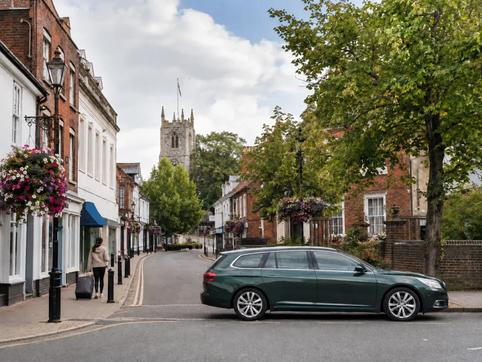 Executive estate car on the traditional high street in Billericay
