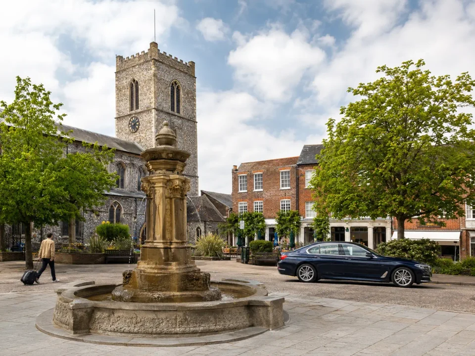 Executive saloon beside the fountain and St Michael's Church in Braintree
