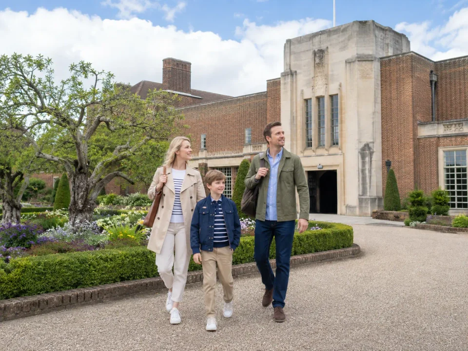 Family visiting the gardens and Art Deco entrance of Eltham Palace
