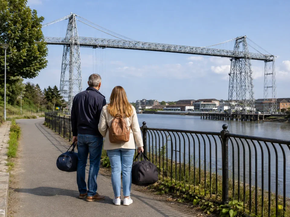 Travellers overlooking the River Usk and Transporter Bridge in Newport