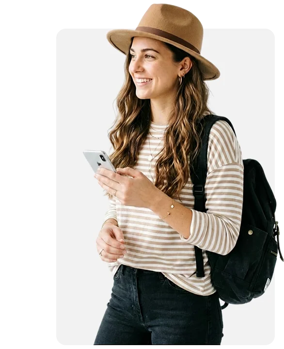 Woman wearing a brown fedora and backpack.